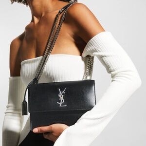 Yves Saint Laurent Sunset grained leather black bag with top handle